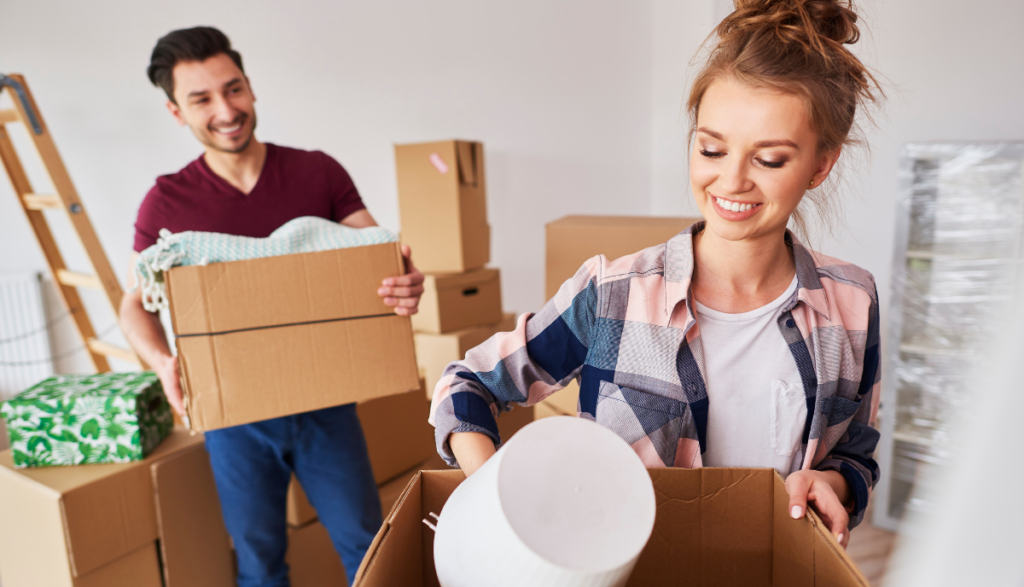 Renter's insurance: A couple unpacking many moving boxes
